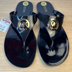 Michael Kors Glossy Black Sandals with Gold Emblem